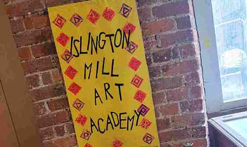 A poster with the words Islington Mill Art Academy